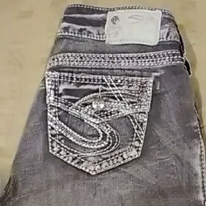 Like new Woman's W26/L31 faded black Silver Jeans